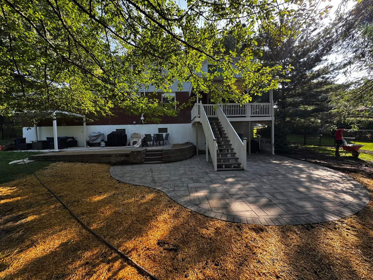 Backyard paver patio completed by Queen City Hardscapes